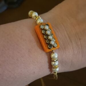Rakhi Orange Gold Thread Pearl Beaded Rhinestone Bracelet